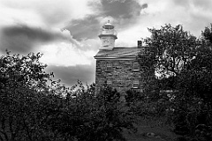 Storm Clouds Around Great Captain Island Light in Connecticut